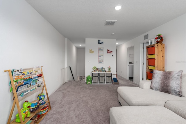 10464 Ladybug Cv, Parrish, FL 34219 - rec room featuring carpet flooring, washer / dryer, recessed lighting, and baseboards