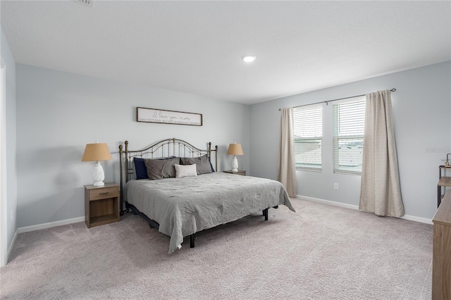 10464 Ladybug Cv, Parrish, FL 34219 - carpeted bedroom featuring baseboards and recessed lighting