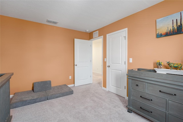 10464 Ladybug Cv, Parrish, FL 34219 - bedroom featuring light carpet and baseboards