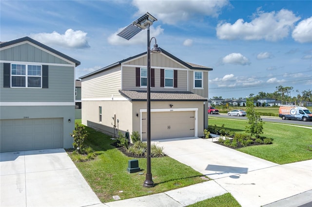 10464 Ladybug Cv, Parrish, FL 34219 - view of front facade with driveway, a garage, a front yard, and board and batten siding