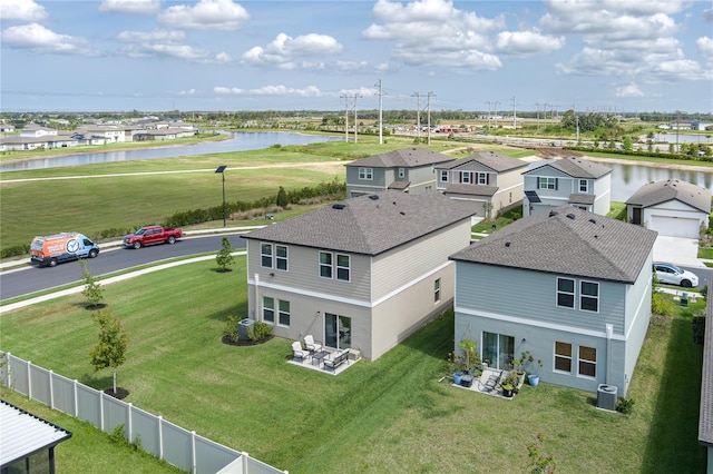 10464 Ladybug Cv, Parrish, FL 34219 - aerial perspective of suburban area with a large body of water