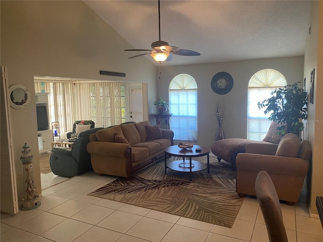 5712 34th Ct W, Bradenton, FL 34210 - living room featuring high vaulted ceiling, ceiling fan, and light tile patterned flooring