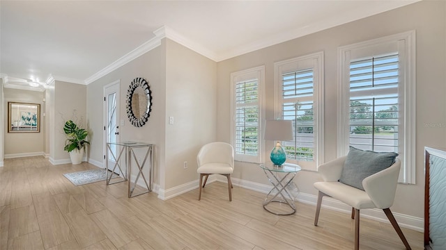 4861 Waterbridge Down, Sarasota, FL 34235 - living area with ornamental molding, plenty of natural light, and light wood-type flooring