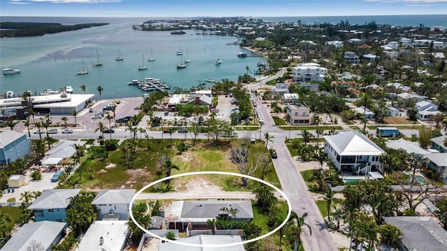 7030 Lois Ave, Longboat Key, FL 34228 - aerial view with a water view and a residential view