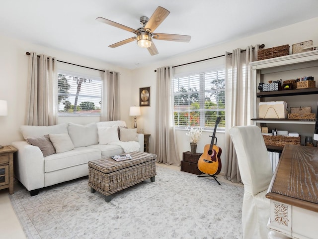 living room with plenty of natural light and a ceiling fan
