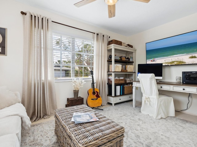 office space with a ceiling fan