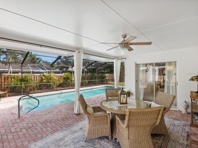 view of pool featuring a fenced in pool, ceiling fan, a fenced backyard, and a patio area