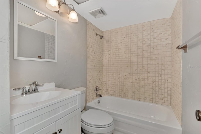 full bath featuring toilet, shower / tub combination, visible vents, and vanity