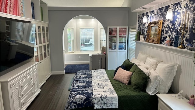 1600 Twin Oaks Cir, Oviedo, FL 32765 - bedroom with baseboards and dark wood-style flooring