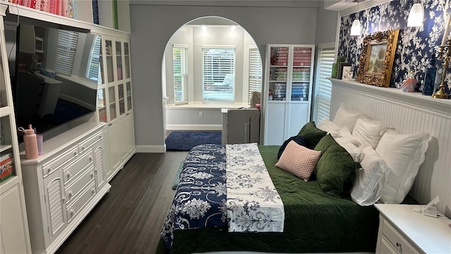 1600 Twin Oaks Cir, Oviedo, FL 32765 - bedroom with baseboards and dark wood-style floors