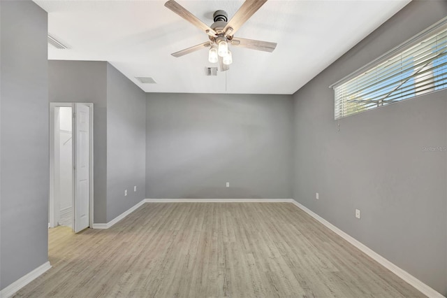 14315 Tree Swallow Way, Lakewood Ranch, FL 34202 - unfurnished room featuring ceiling fan, light wood finished floors, and baseboards