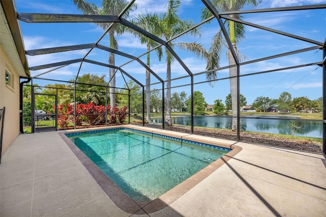 14315 Tree Swallow Way, Lakewood Ranch, FL 34202 - swimming pool with a water view, a patio area, and a lanai