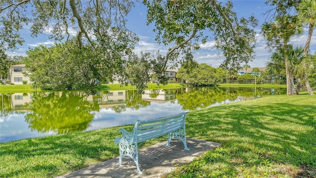 5057 Live Oak Cir Unit 86, Bradenton, FL 34207 - surrounding community with a water view and a yard