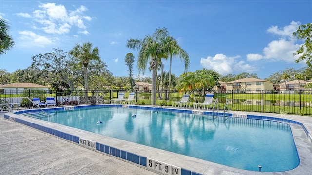 5057 Live Oak Cir Unit 86, Bradenton, FL 34207 - community pool featuring a residential view