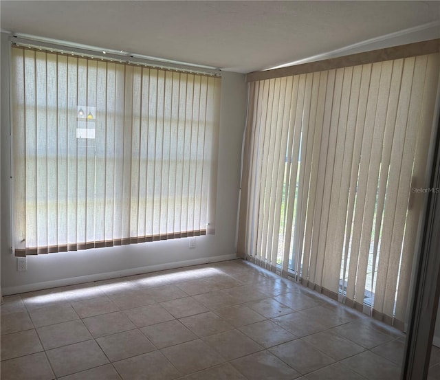 5057 Live Oak Cir Unit 86, Bradenton, FL 34207 - empty room with tile patterned floors