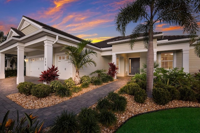 569 Mast Dr, Bradenton, FL 34208 - view of front facade with an attached garage and driveway