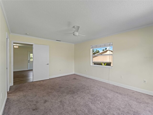 3405 10th St W, Palmetto, FL 34221 - spare room featuring a textured ceiling, a ceiling fan, crown molding, and carpet