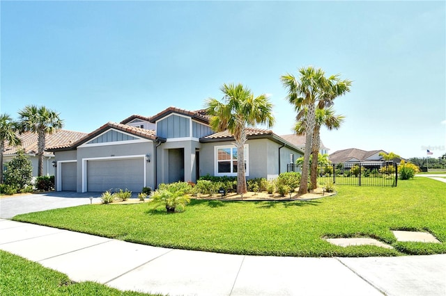view of front facade featuring a garage, fence, stucco siding, and a tiled roof