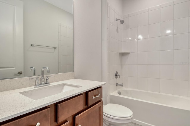 full bath featuring vanity, toilet, and bathtub / shower combination