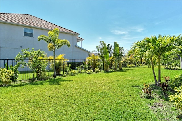 view of yard with fence