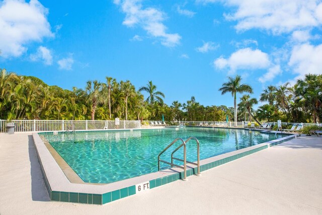 5736 Ashton Lake Dr, Sarasota, FL 34231 - community pool featuring view of wooded area