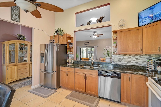1789 Elm Dr, Venice, FL 34293 - kitchen with open shelves, a sink, stainless steel appliances, a ceiling fan, and a high ceiling