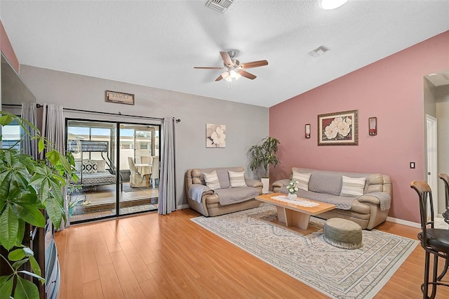 1789 Elm Dr, Venice, FL 34293 - living area with light wood-type flooring, ceiling fan, baseboards, and visible vents