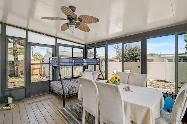 1789 Elm Dr, Venice, FL 34293 - sunroom / solarium with a ceiling fan and outdoor dining space
