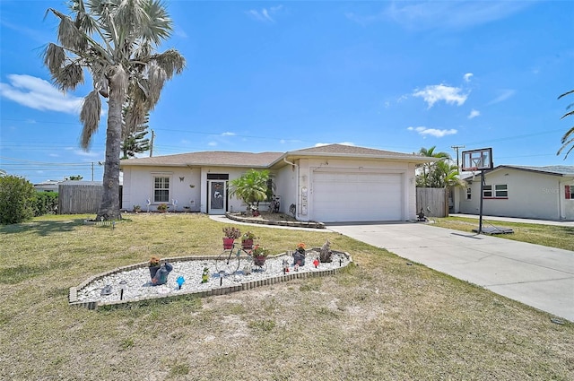 1789 Elm Dr, Venice, FL 34293 - ranch-style home featuring stucco siding, fence, driveway, a front lawn, and an attached garage
