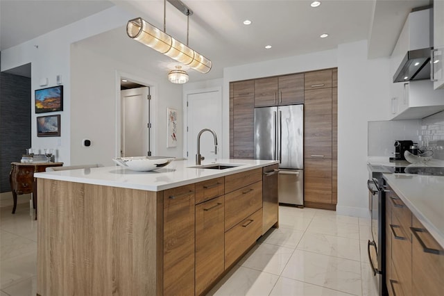 111 S Pineapple Ave Unit 716, Sarasota, FL 34236 - kitchen with marble finish floor, modern cabinets, light countertops, a sink, and stainless steel appliances