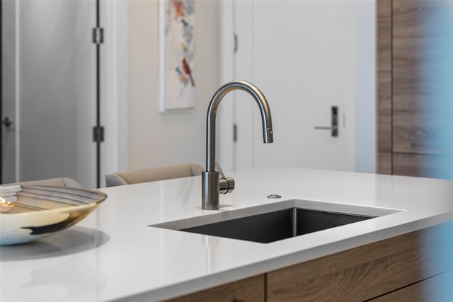 111 S Pineapple Ave Unit 716, Sarasota, FL 34236 - interior details with light countertops and a sink