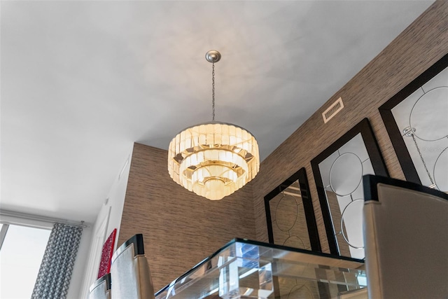 111 S Pineapple Ave Unit 716, Sarasota, FL 34236 - room details featuring an inviting chandelier and visible vents