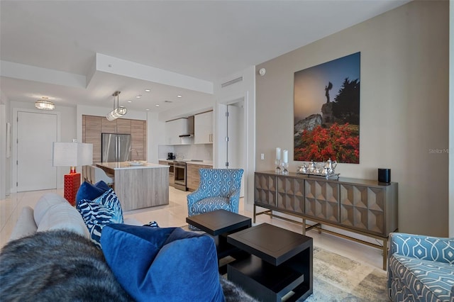 111 S Pineapple Ave Unit 716, Sarasota, FL 34236 - living room with visible vents, recessed lighting, and light tile patterned floors