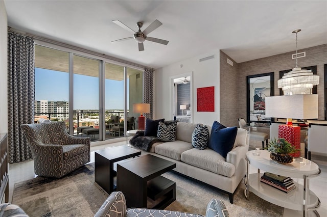 111 S Pineapple Ave Unit 716, Sarasota, FL 34236 - living room featuring visible vents and a ceiling fan