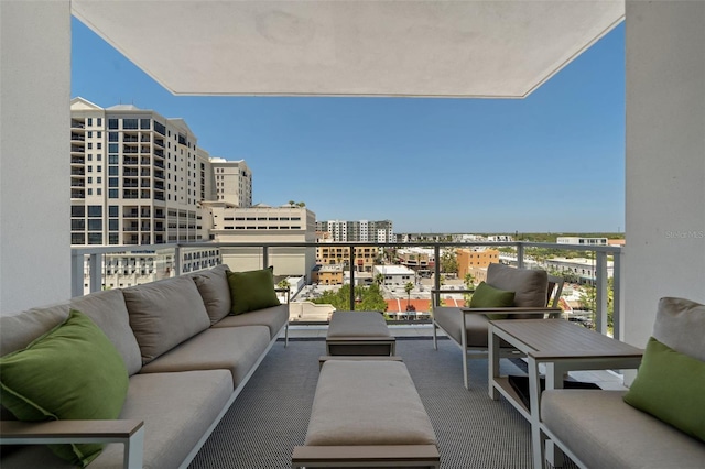 111 S Pineapple Ave Unit 716, Sarasota, FL 34236 - balcony with a view of city and an outdoor hangout area