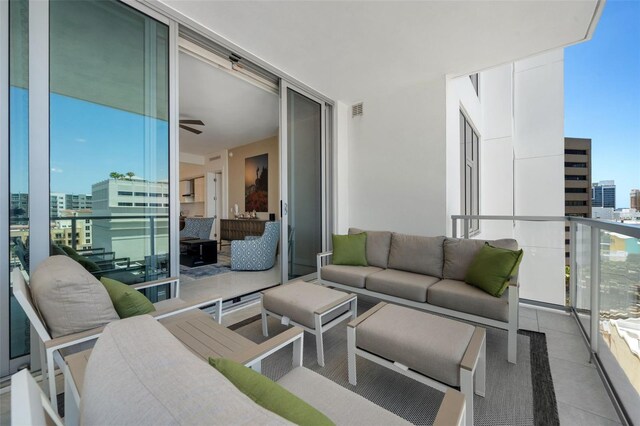 111 S Pineapple Ave Unit 716, Sarasota, FL 34236 - balcony with a view of city, an outdoor living space, and visible vents