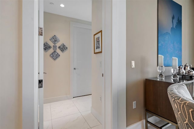 111 S Pineapple Ave Unit 716, Sarasota, FL 34236 - hall featuring baseboards, recessed lighting, and marble finish floor