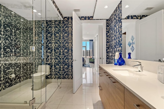 111 S Pineapple Ave Unit 716, Sarasota, FL 34236 - full bathroom with visible vents, vanity, and wallpapered walls