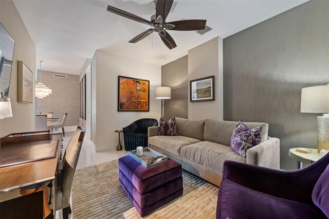 111 S Pineapple Ave Unit 716, Sarasota, FL 34236 - living room with a ceiling fan and visible vents