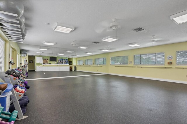 752 White Pine Tree Rd Unit 101, Venice, FL 34285 - interior space with visible vents and baseboards