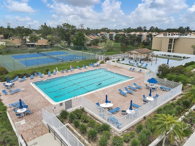 752 White Pine Tree Rd Unit 101, Venice, FL 34285 - community pool with fence and a patio area