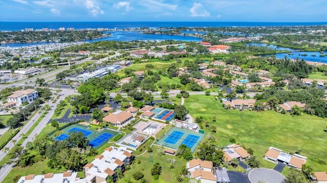 752 White Pine Tree Rd Unit 101, Venice, FL 34285 - drone / aerial view featuring a water view and a residential view