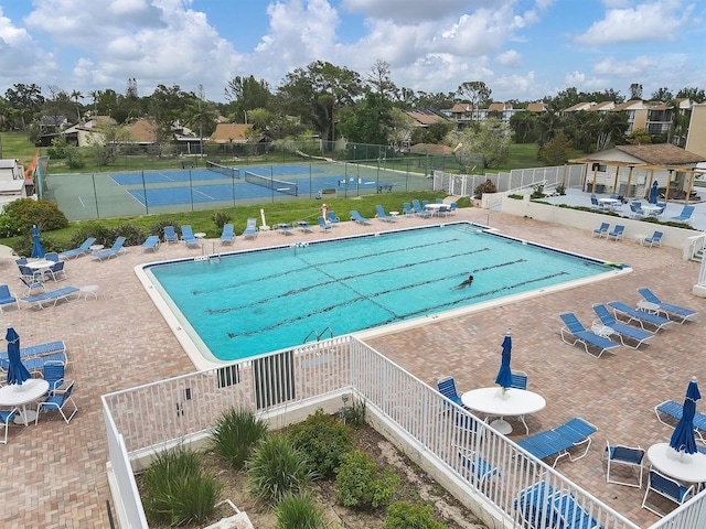 752 White Pine Tree Rd Unit 101, Venice, FL 34285 - community pool with a patio area and fence