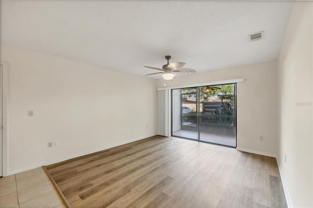 752 White Pine Tree Rd Unit 101, Venice, FL 34285 - spare room with baseboards, visible vents, ceiling fan, and light wood-style flooring