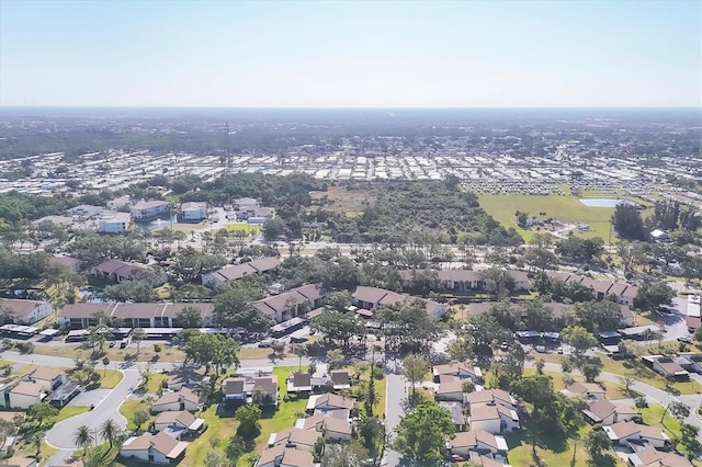 752 White Pine Tree Rd Unit 101, Venice, FL 34285 - drone / aerial view featuring a residential view