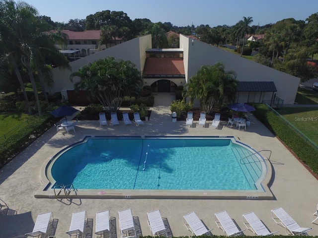 3843 El Poinier Ct W Unit 8720, Sarasota, FL 34232 - community pool with a patio