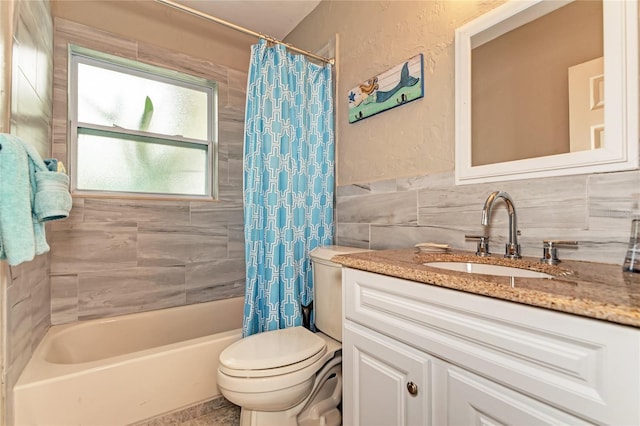 bathroom featuring tile walls, shower / bath combo, toilet, and vanity