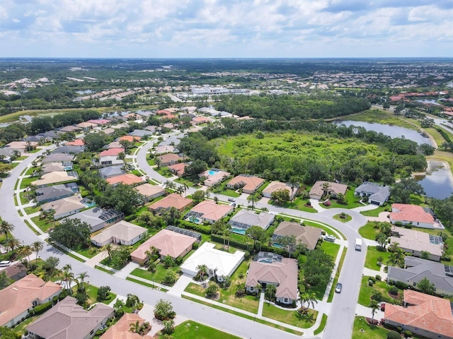 5106 Far Oak Cir, Sarasota, FL 34238 - birds eye view of property with a water view and a residential view