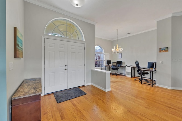 5106 Far Oak Cir, Sarasota, FL 34238 - foyer featuring an inviting chandelier, baseboards, light wood-type flooring, visible vents, and ornamental molding