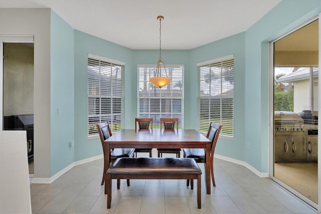 5106 Far Oak Cir, Sarasota, FL 34238 - dining space with light tile patterned flooring and baseboards